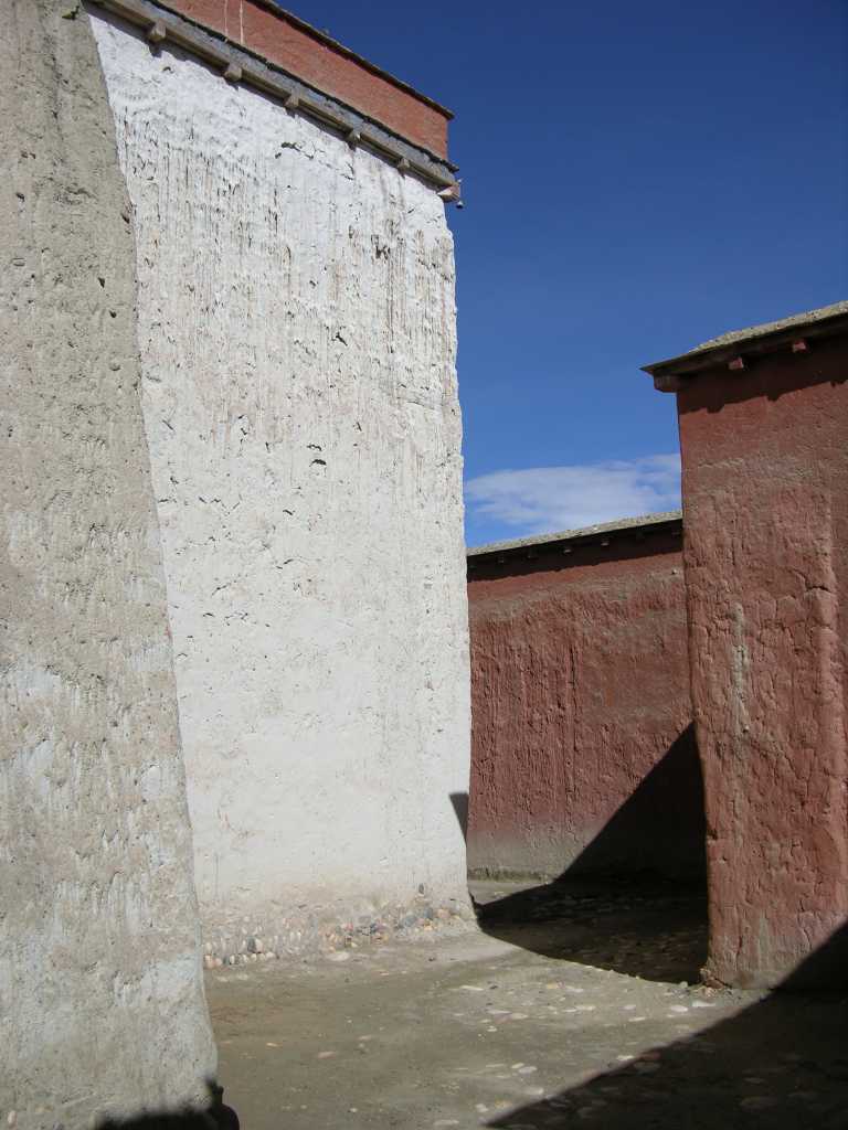 Tibet Guge 03 Tholing 18 Yeshe O Temple Inside Kora The entrance is now a small museum. After passing the empty pedestals, we walked the inner kora between the outer and inner walls.